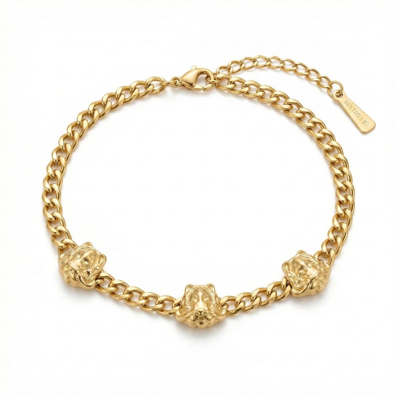 A stylish gold bracelet made of rust-resistant stainless steel, with a wide chain design and three luxurious prominent tiger-shaped heads, with an adjustable clasp to fit you. - Image 1